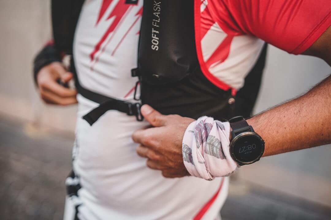 Photo of runner with Garmin smartwatch