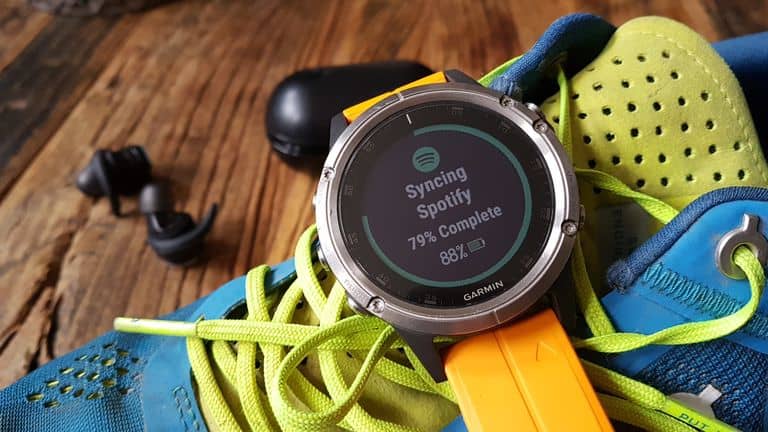 Photo of runner with Garmin smartwatch from Runners World